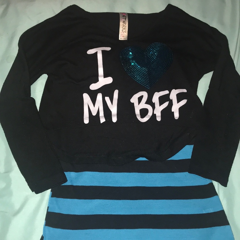 Black crop top and black and blue tank top.